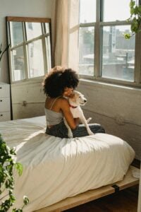 Bearsleys woman home dog apartment scaled