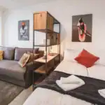 Bright ground floor studio with modern furnishings and stylish decor.